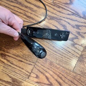 Black Nintendo Wii Controller and numchuk Nintendo Wii
